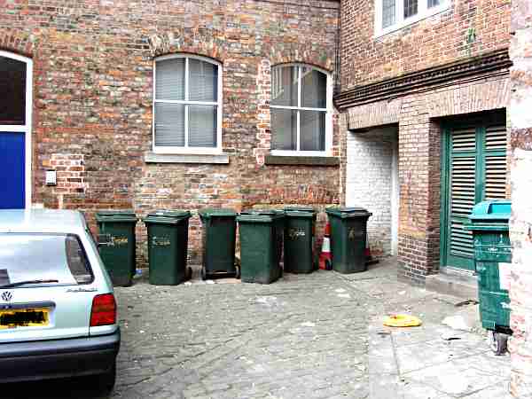 Lane leading to the yard and to Pavement.