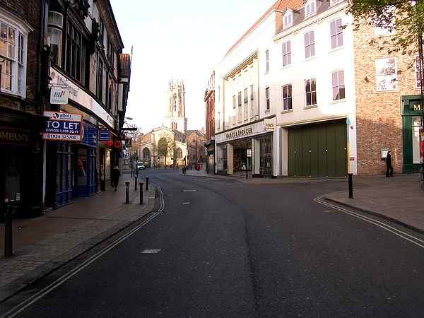 Looking southwest along the full length of Pavement to the church of All Saints with its prominent lantern tower.