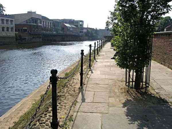 On the south bank of the river looking towards Ouse Bridge.