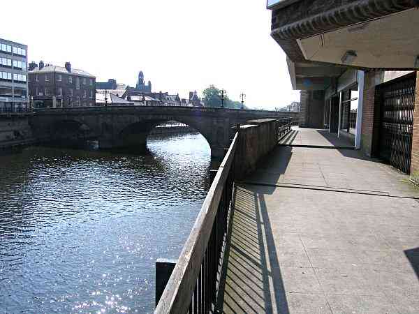 On the south bank of the river looking towards Ouse Bridge.